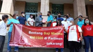 Minimum wage banner with a group